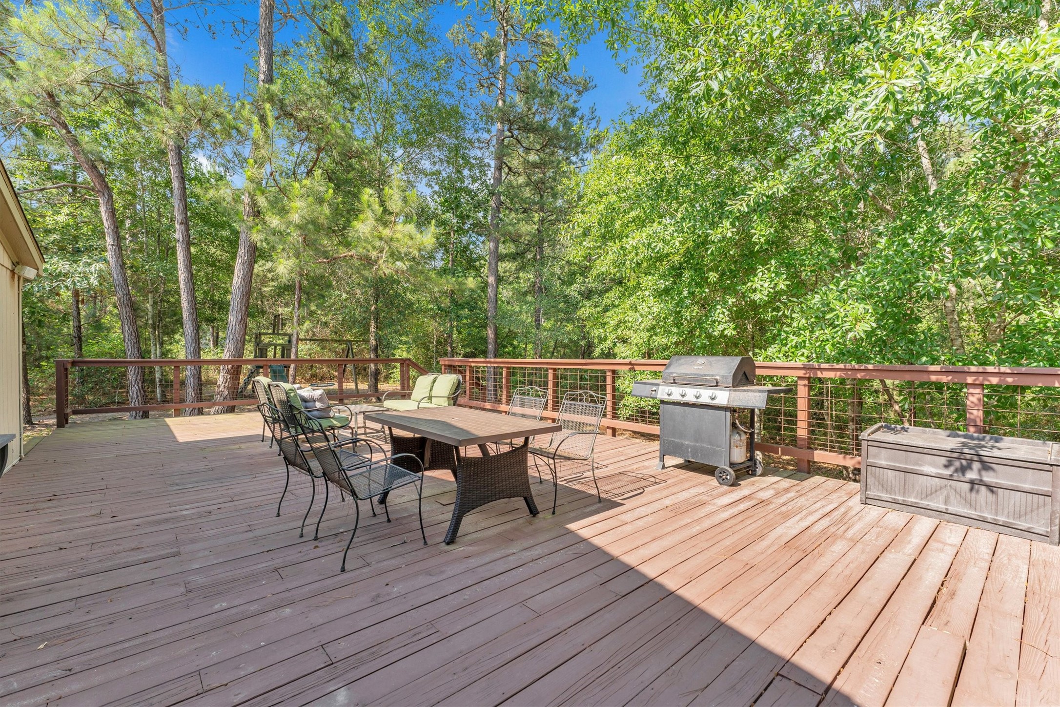 50 Fm 3179 Road Huntsville, TX 77320 - Photo 32 of 45 Wraparound porch creates additional outdoor living space ideal for morning coffee or evening sunsets.