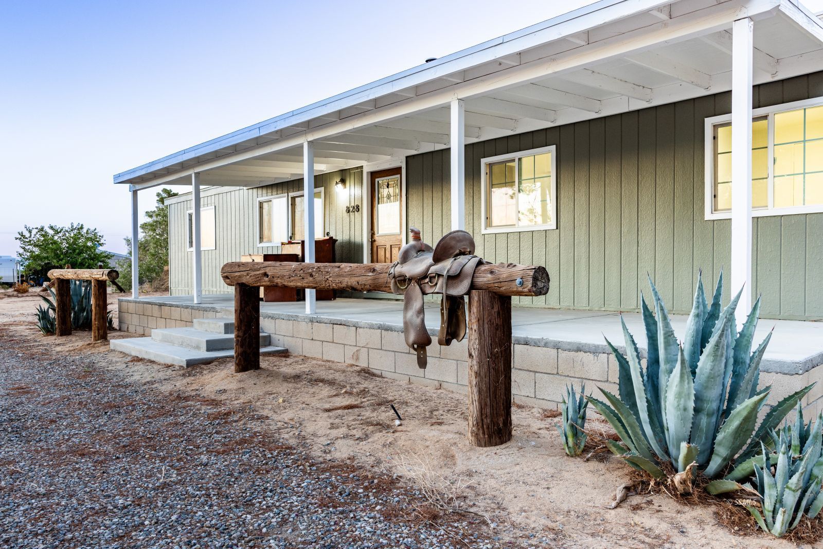 828 North Victor Street Ridgecrest, CA 93555 - Photo 6 of 50 a view of a house with backyard and sitting area