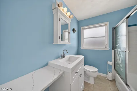 a view of a room with a large window