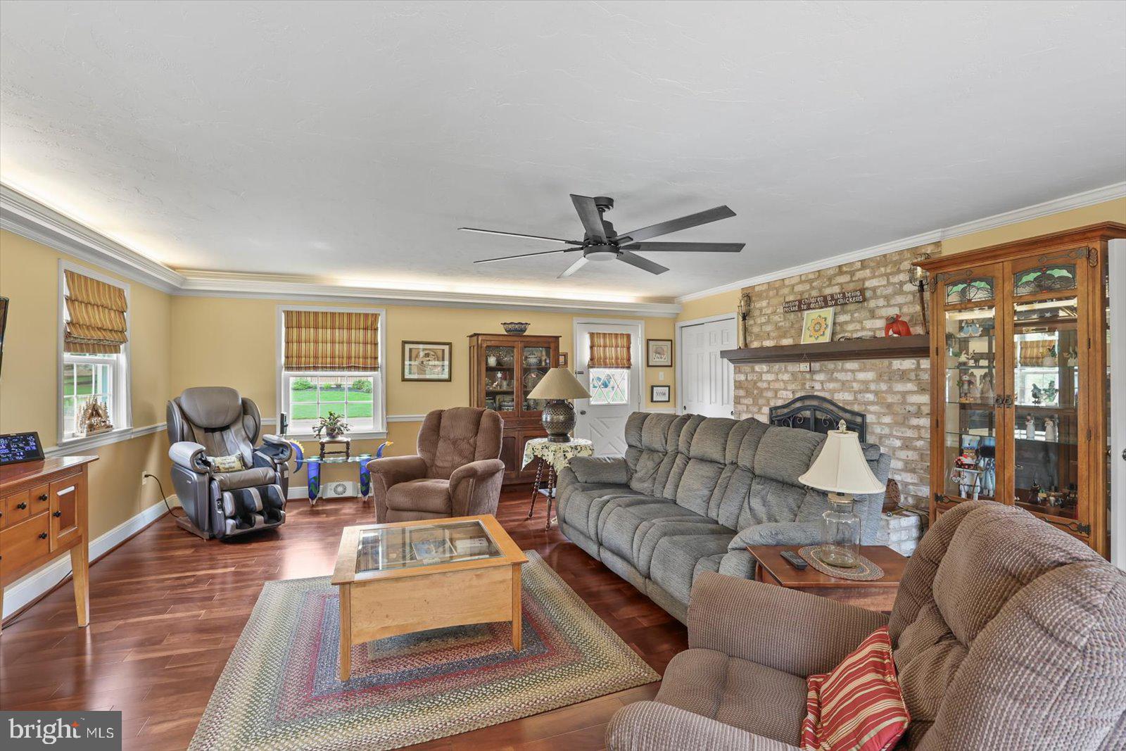 124 Lexington Road York, PA 17402 - Photo 12 of 56 a living room with furniture and a large window