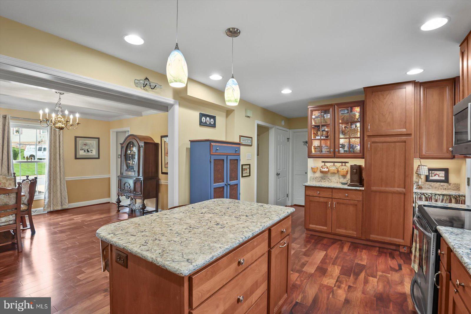124 Lexington Road York, PA 17402 - Photo 17 of 56 a kitchen with stainless steel appliances granite countertop a kitchen island a stove and a sink