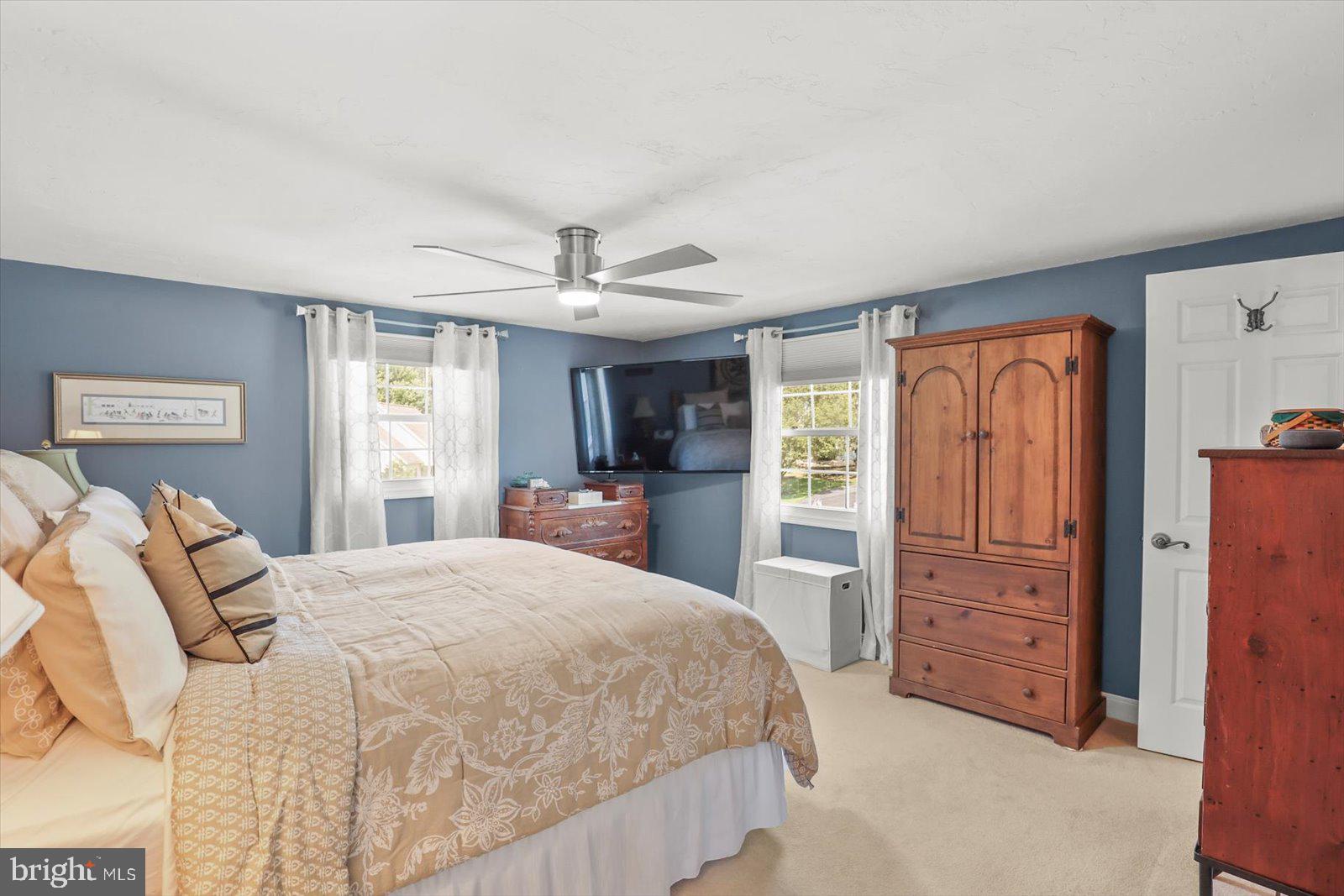 124 Lexington Road York, PA 17402 - Photo 27 of 56 a bedroom with a bed and a dresser