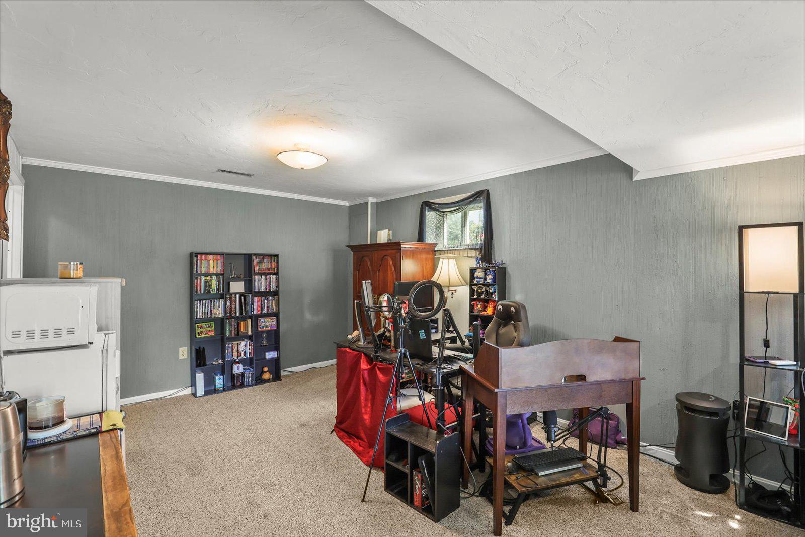 124 Lexington Road York, PA 17402 - Photo 31 of 56 a view of a room with gym equipment