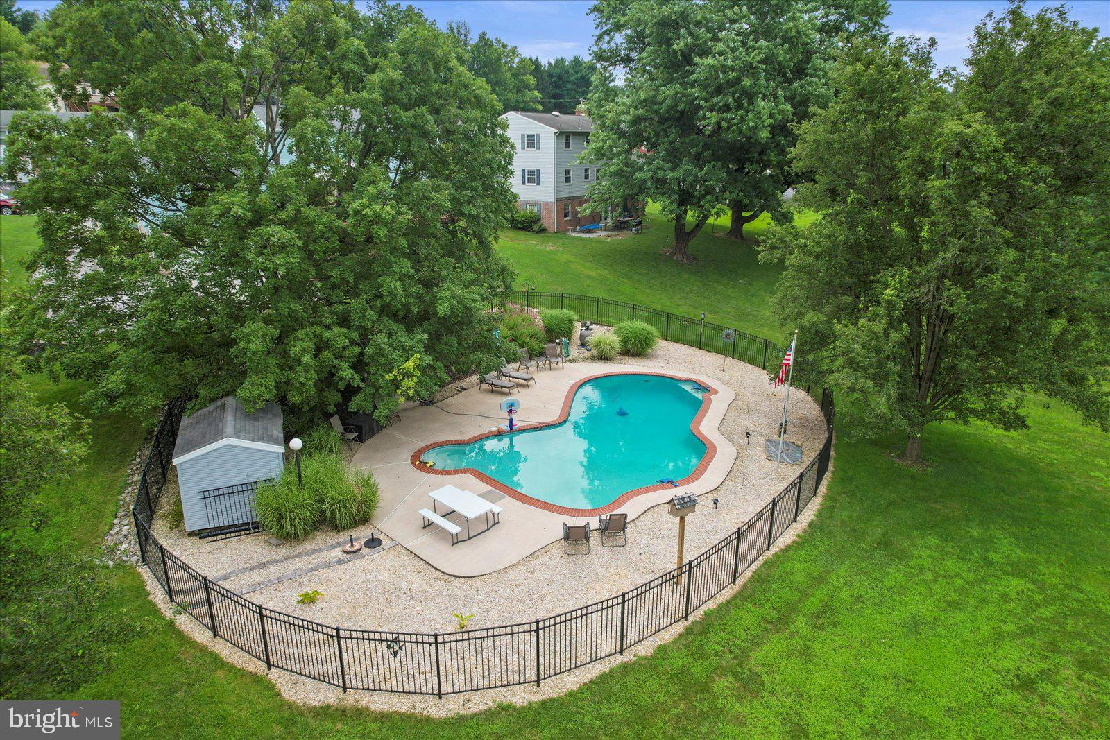 124 Lexington Road York, PA 17402 - Photo 5 of 56 a view of a swimming pool with back yard