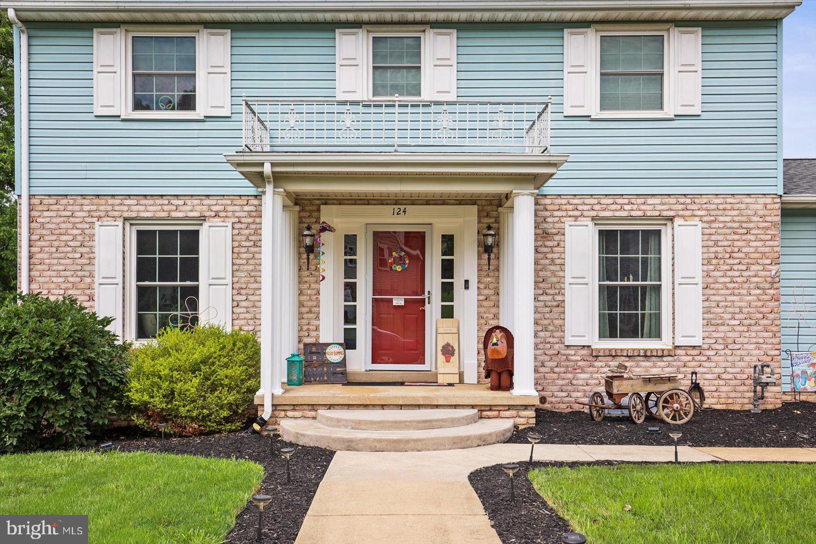 124 Lexington Road York, PA 17402 - Photo 6 of 56 a front view of a house with a yard