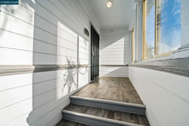 a close up of a utility room with dryer and washer