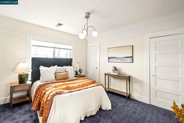 a view of a room with a refrigerator