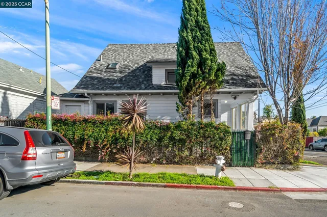 an aerial view of residential building with green space