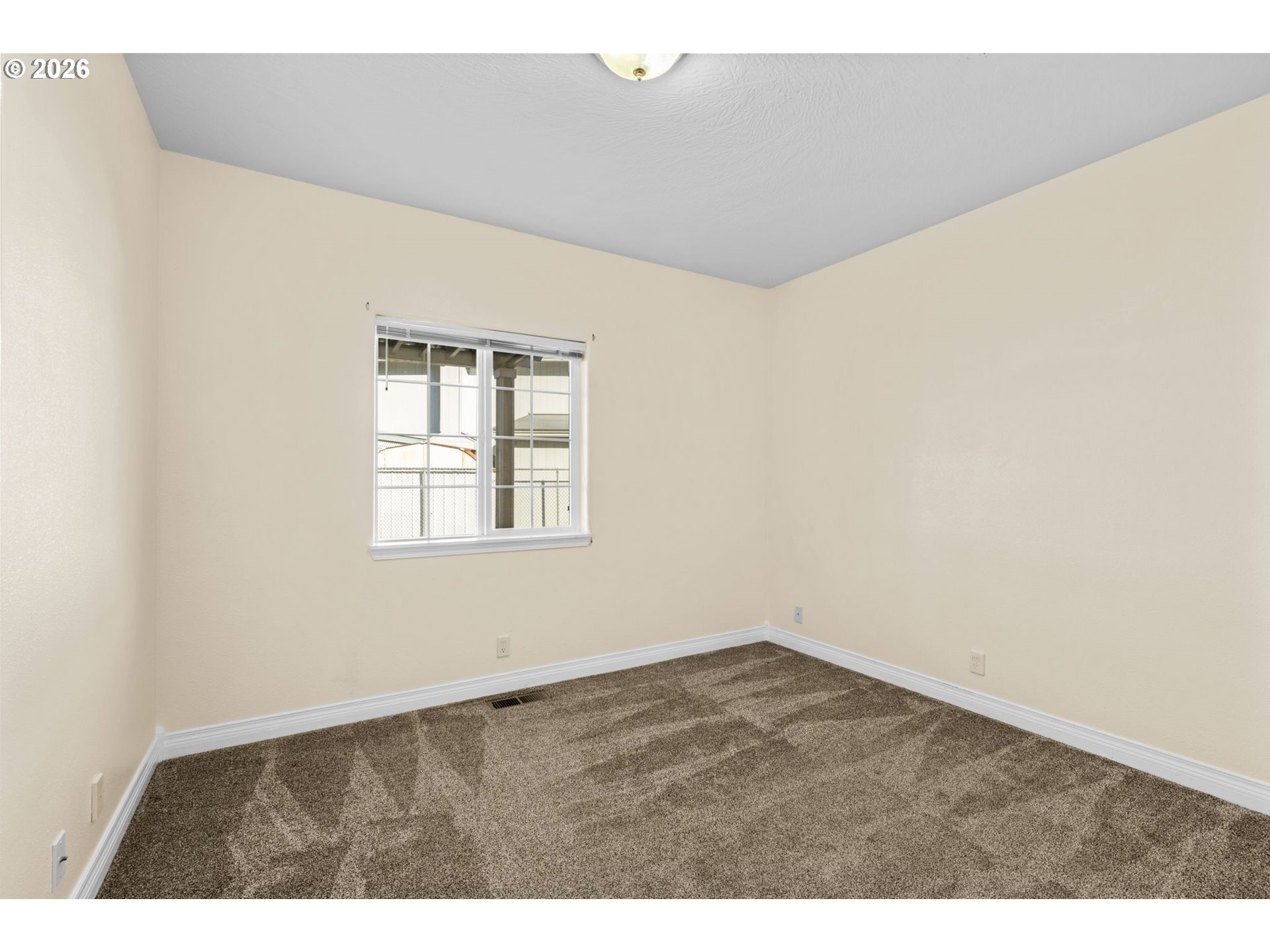 6540 B Street Springfield, OR 97478 - Photo 19 of 48 an empty room with windows