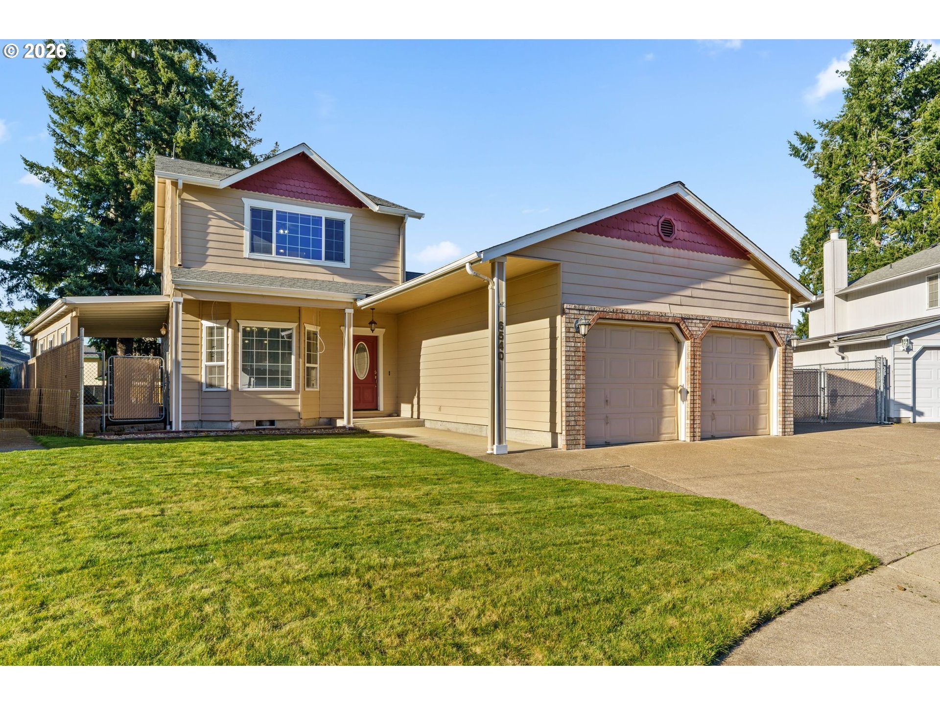 6540 B Street Springfield, OR 97478 - Photo 2 of 48 a front view of a house with a yard