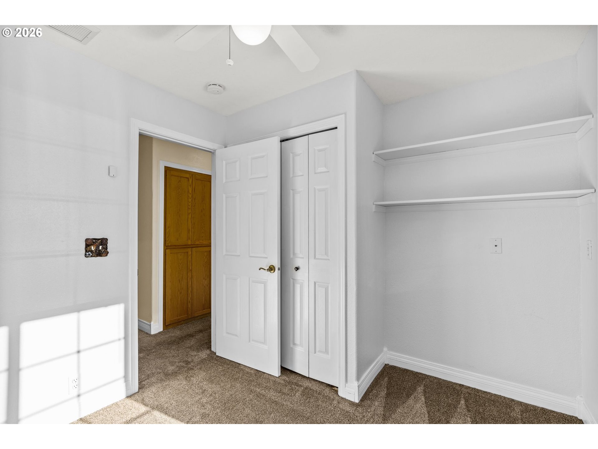 6540 B Street Springfield, OR 97478 - Photo 35 of 48 a view of a hallway with a dining room