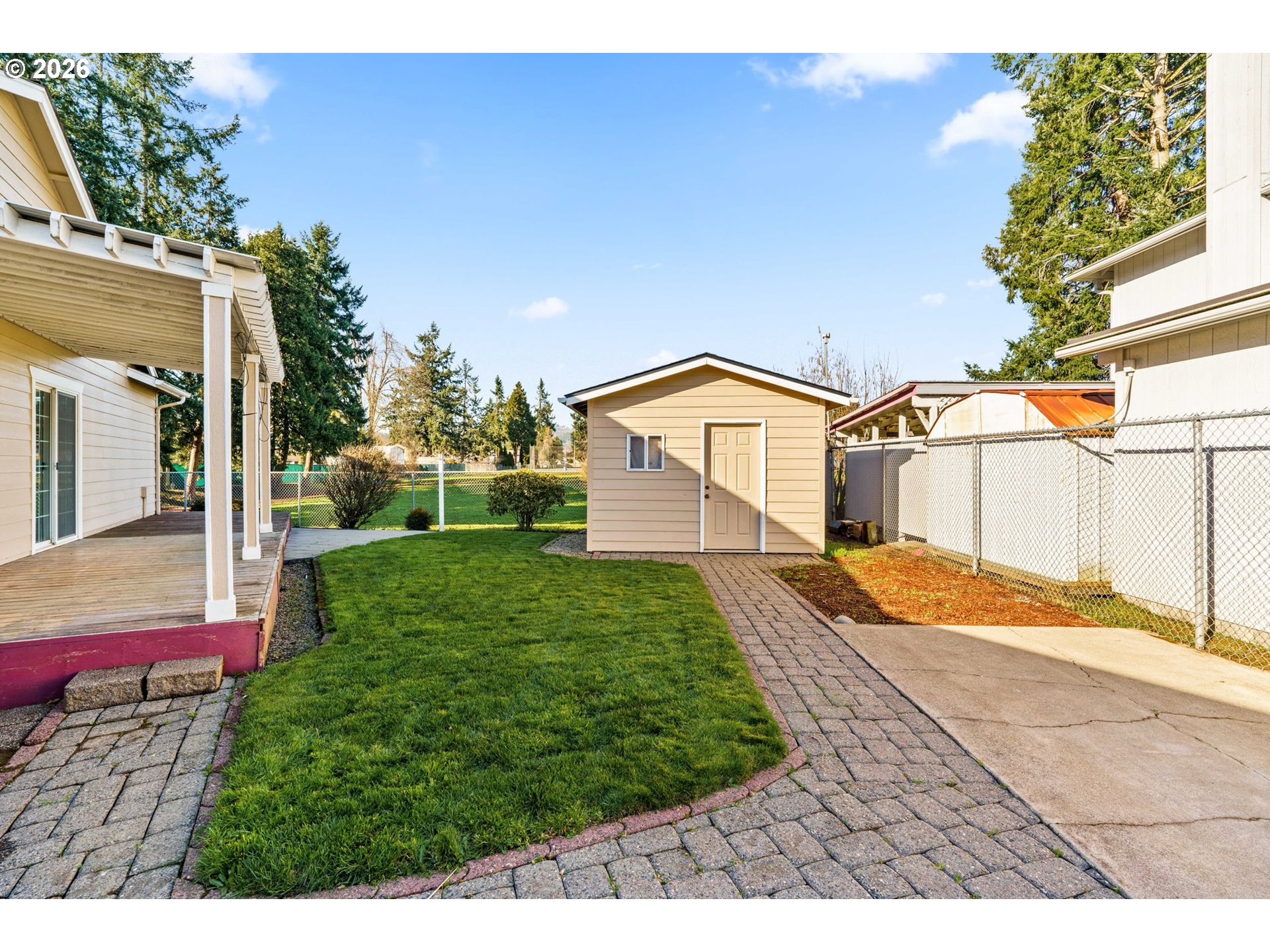 6540 B Street Springfield, OR 97478 - Photo 46 of 48 a front view of a house with garden