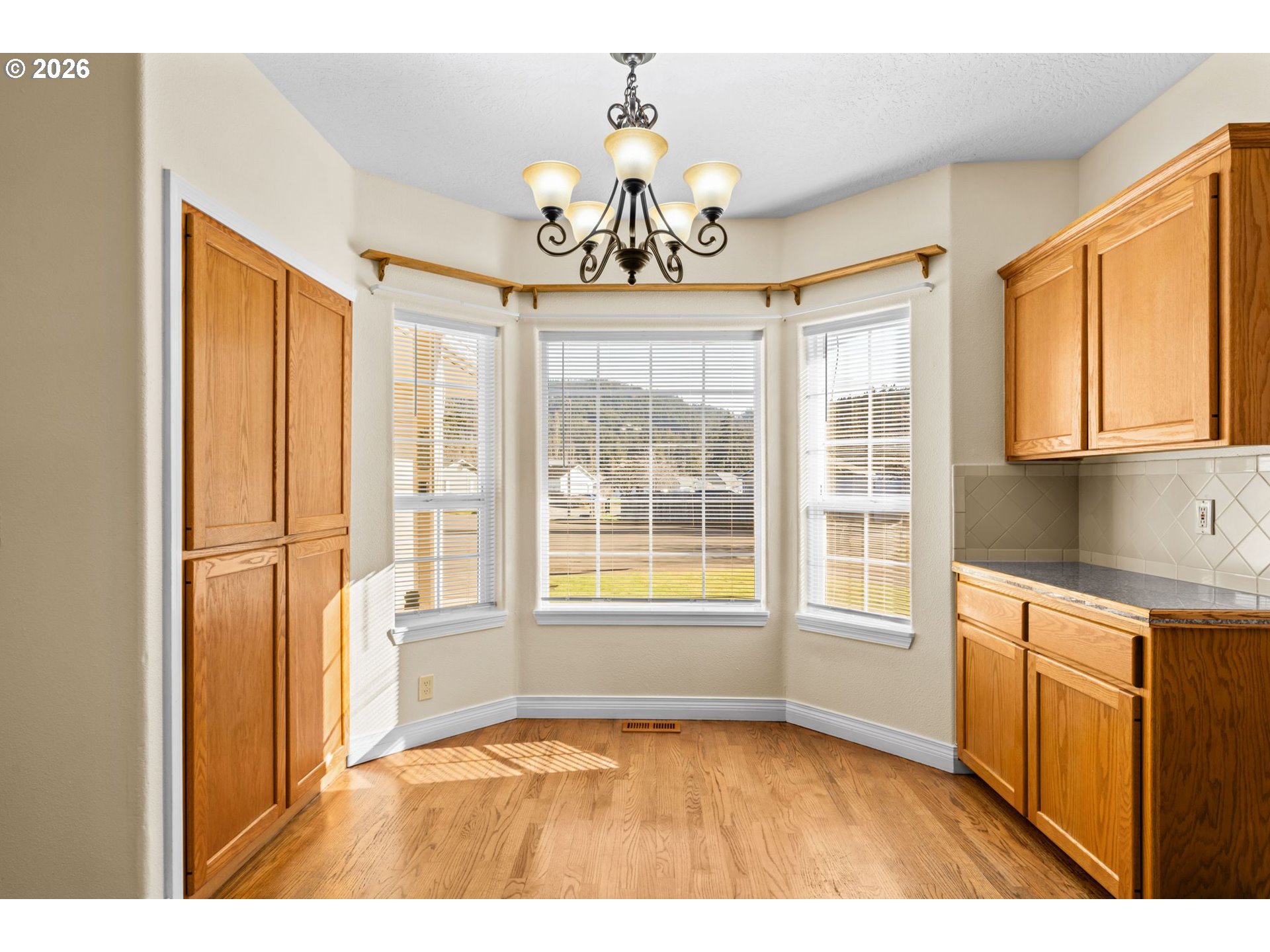 6540 B Street Springfield, OR 97478 - Photo 6 of 48 a view of an empty room with a window