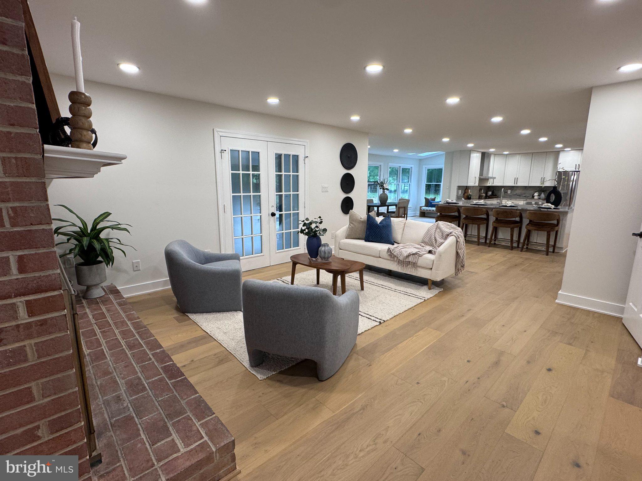 1132 Springvale Road Great Falls, VA 22066 - Photo 10 of 18 Bright, inviting open living space.