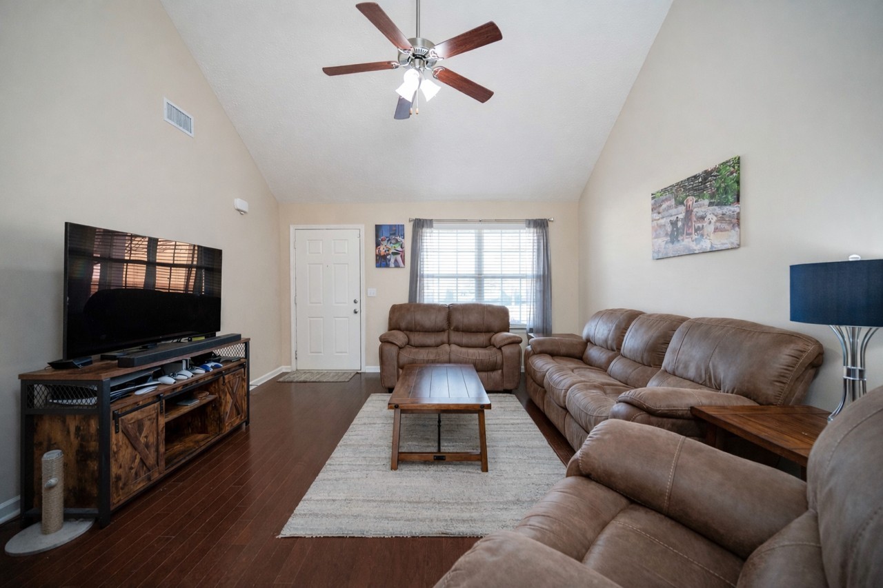 3448 Risen Star Drive Murfreesboro, TN 37128 - Photo 3 of 19 a living room with furniture and a flat screen tv
