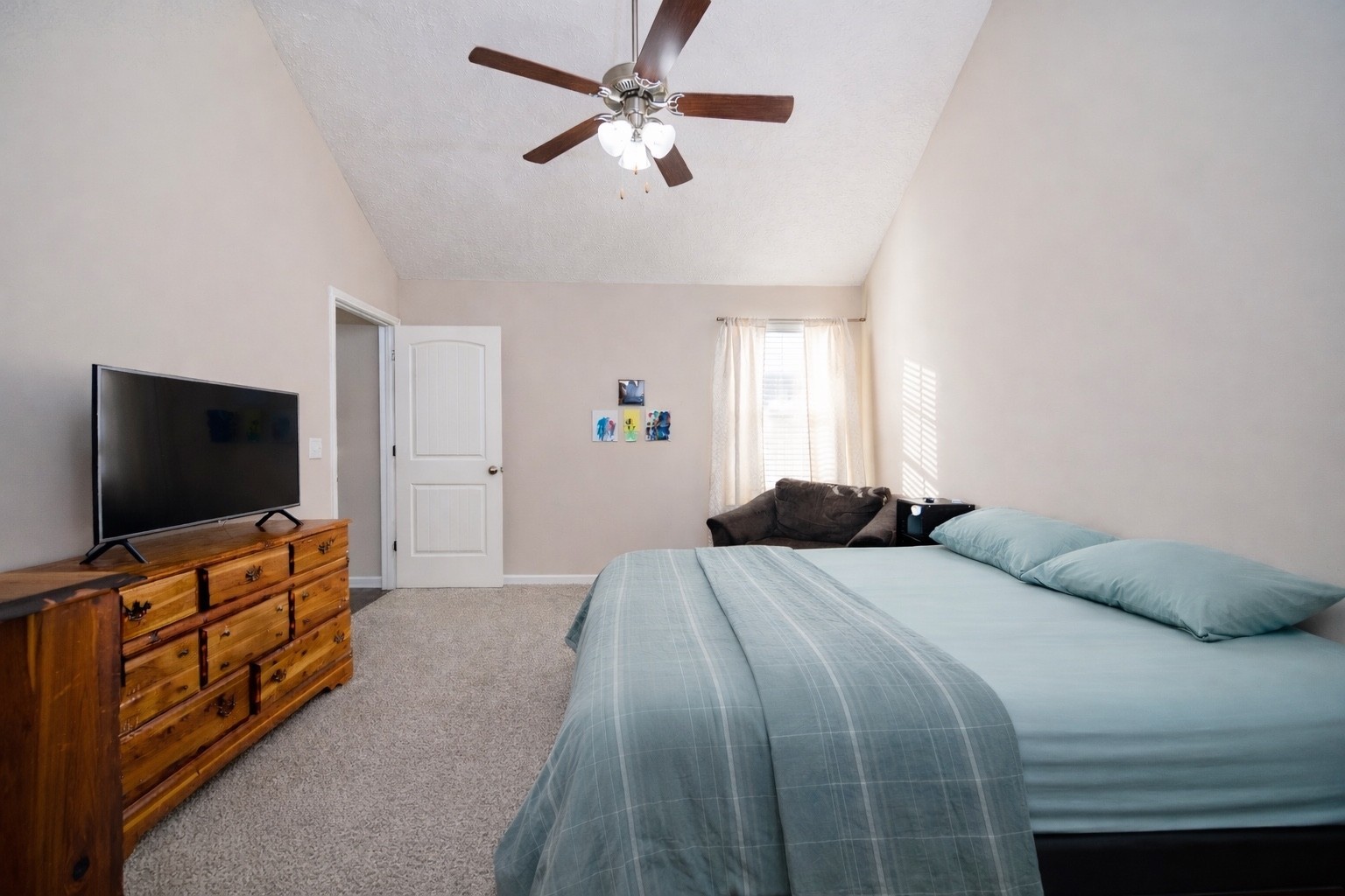 3448 Risen Star Drive Murfreesboro, TN 37128 - Photo 9 of 19 a bedroom with a bed and a flat screen tv