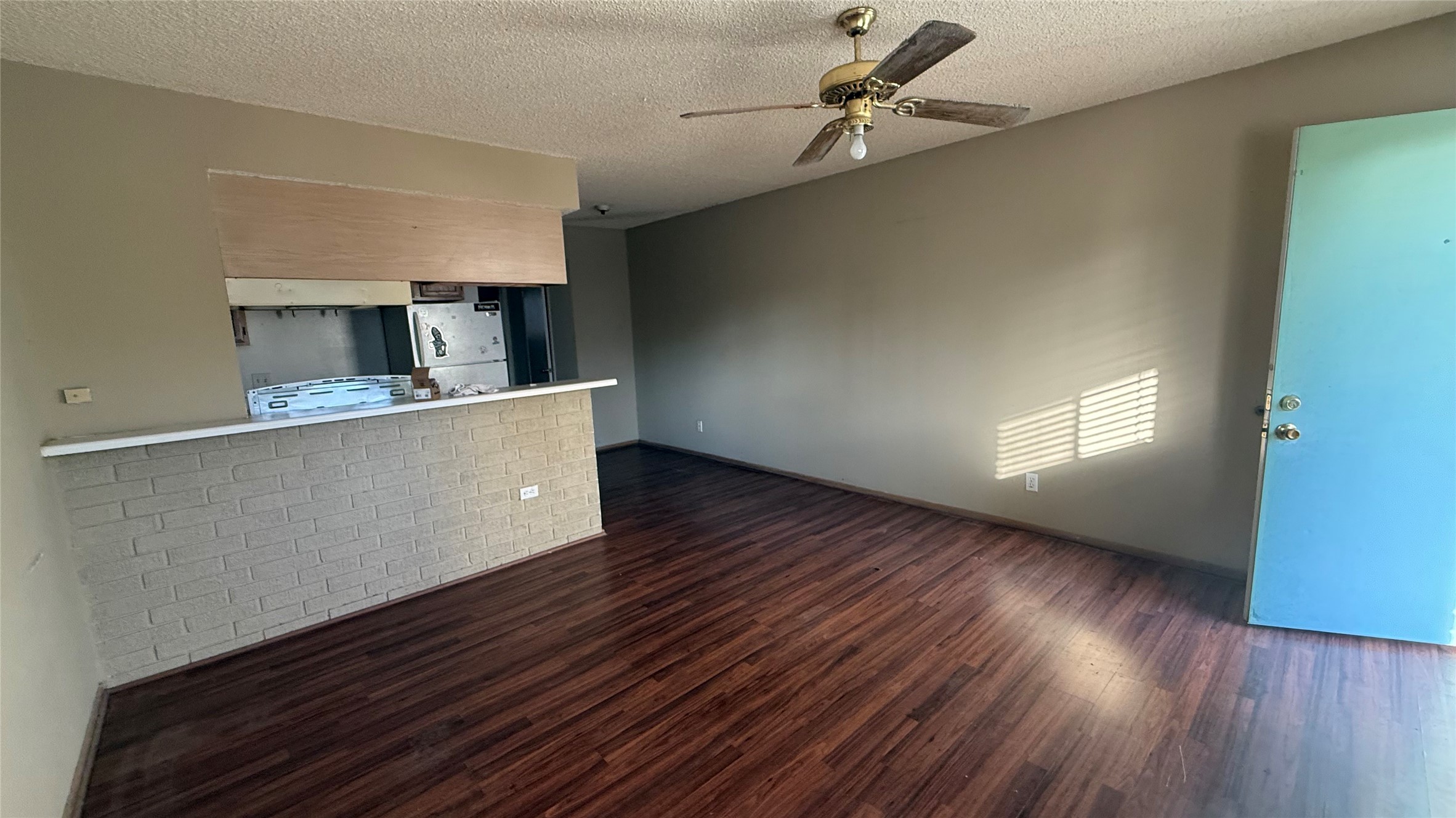 1328 Bomar Street, Unit 4 Houston, TX 77006 - Photo 7 of 7 a view of a room with wooden floor and staircase