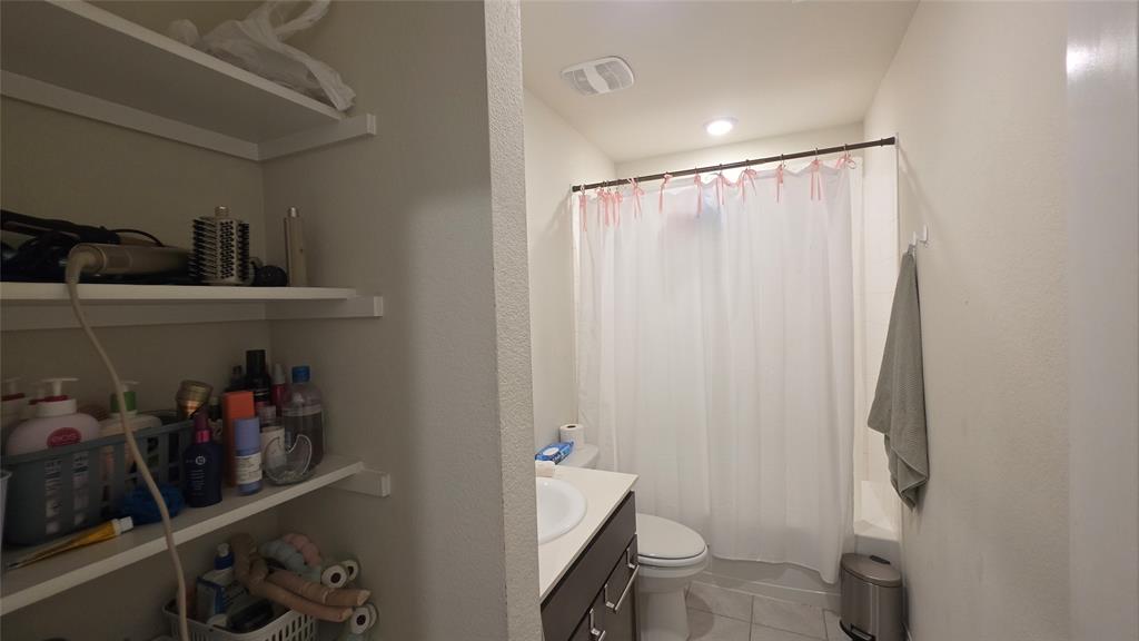 409 Samuel Street Denton, TX 76207 - Photo 11 of 40 a room with storage and utility