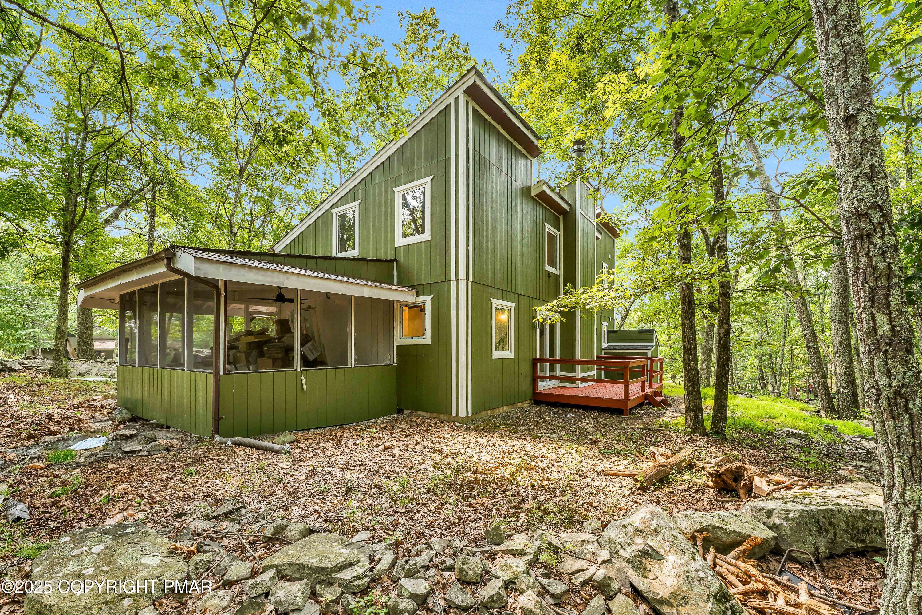 151 Elgin Way Bushkill, PA 18324 - Photo 13 of 60 a front view of a house with a garden