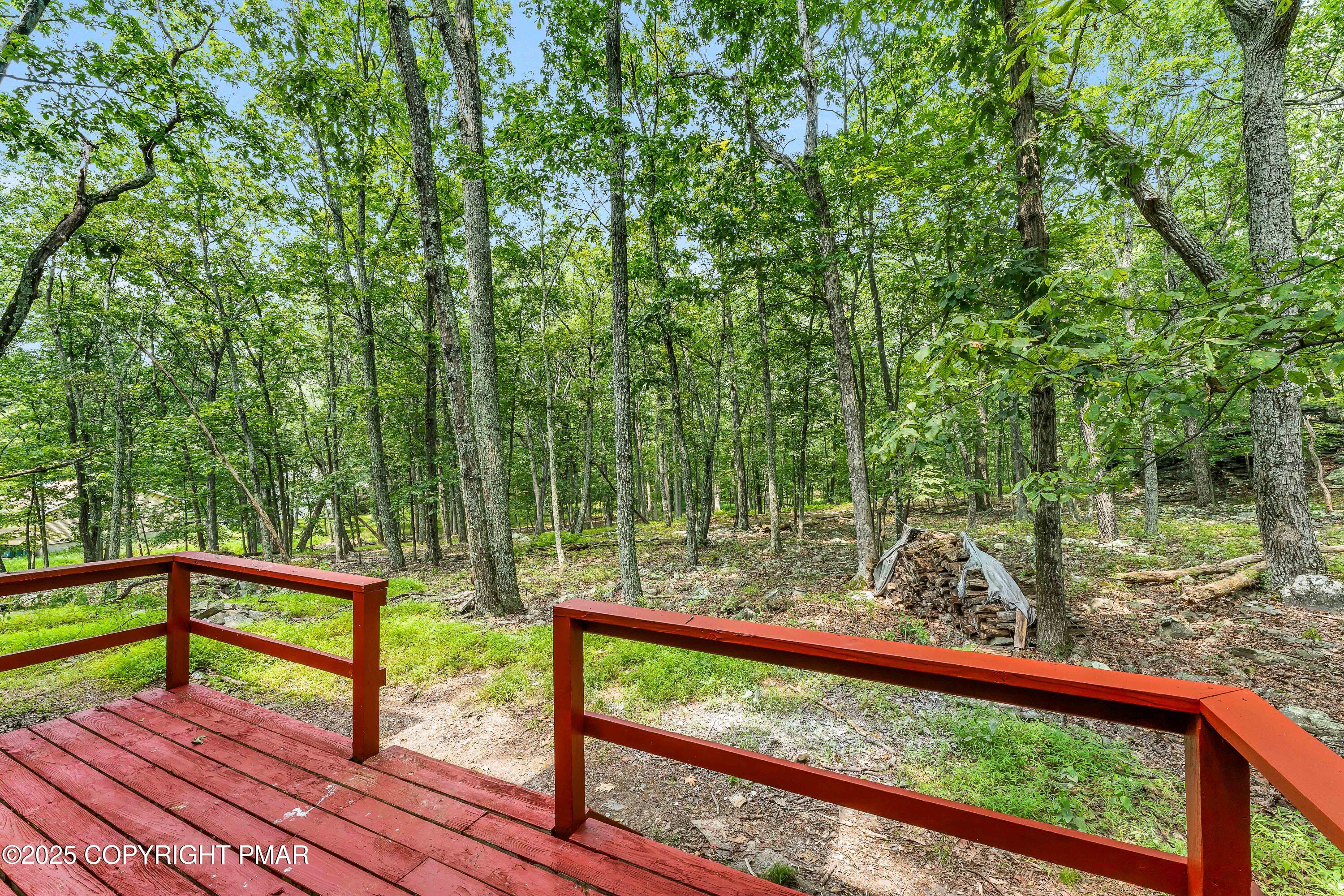 151 Elgin Way Bushkill, PA 18324 - Photo 16 of 60 a view of a lake from a balcony