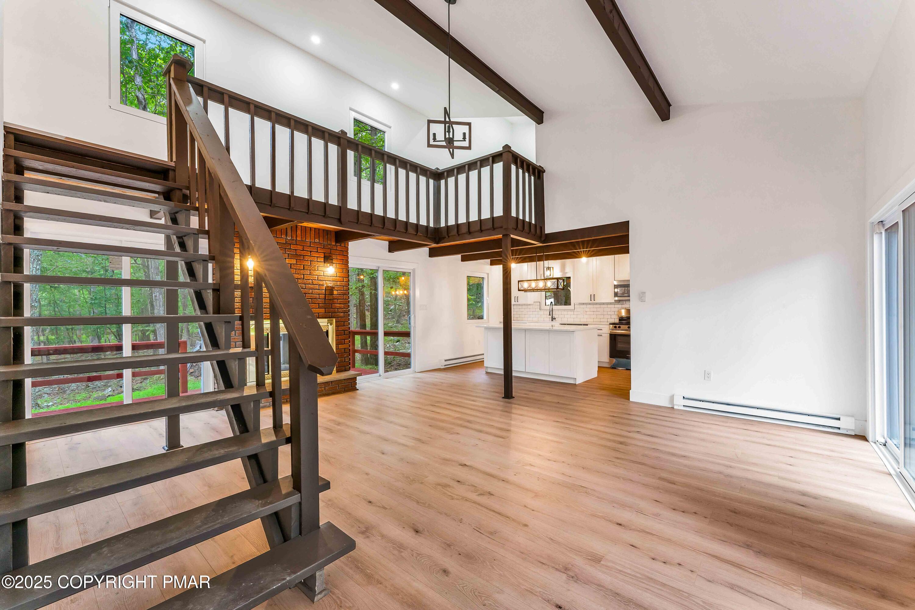 151 Elgin Way Bushkill, PA 18324 - Photo 26 of 60 a view of entryway with wooden floor and stairs