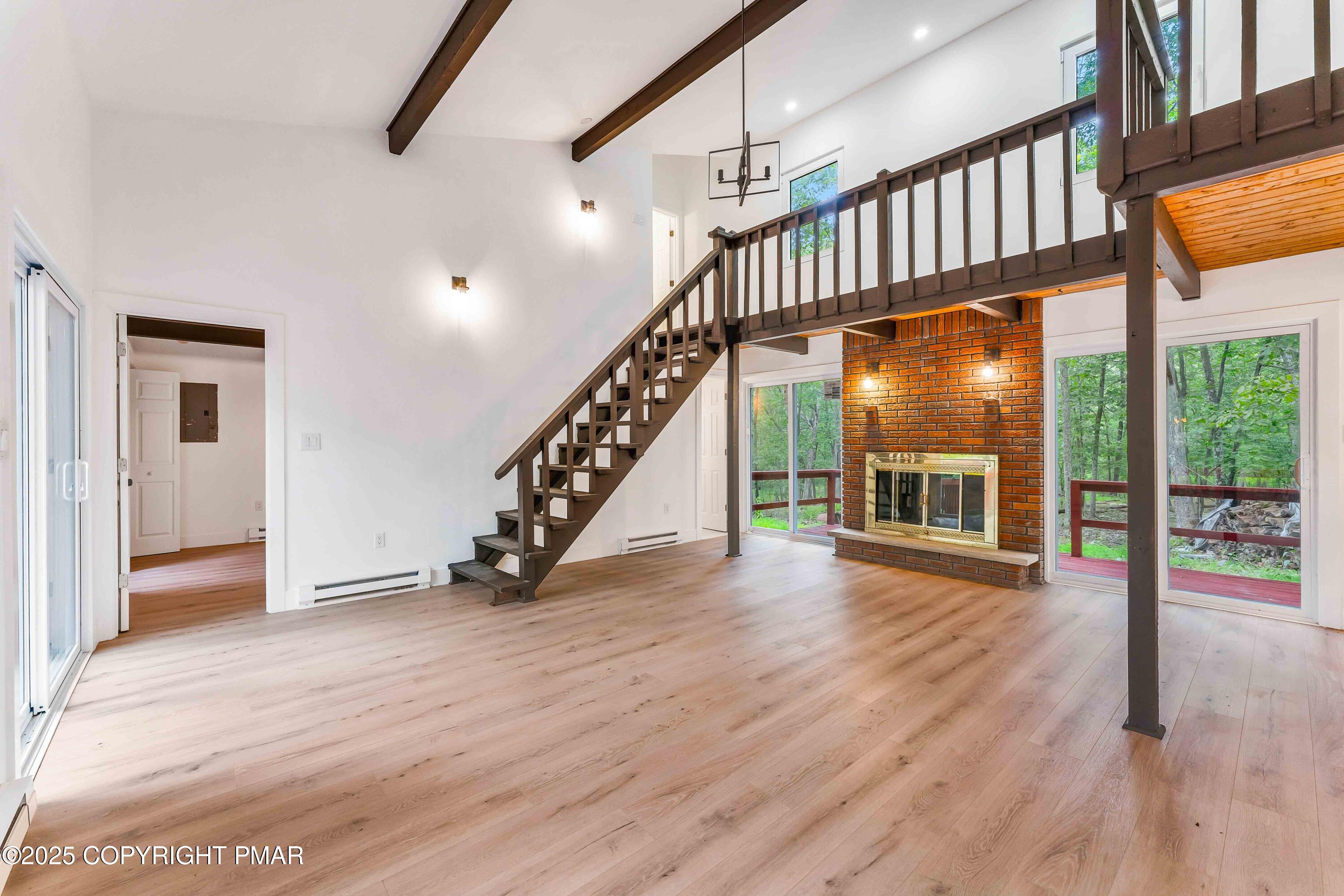 151 Elgin Way Bushkill, PA 18324 - Photo 27 of 60 a view of an entryway with wooden floor stairs