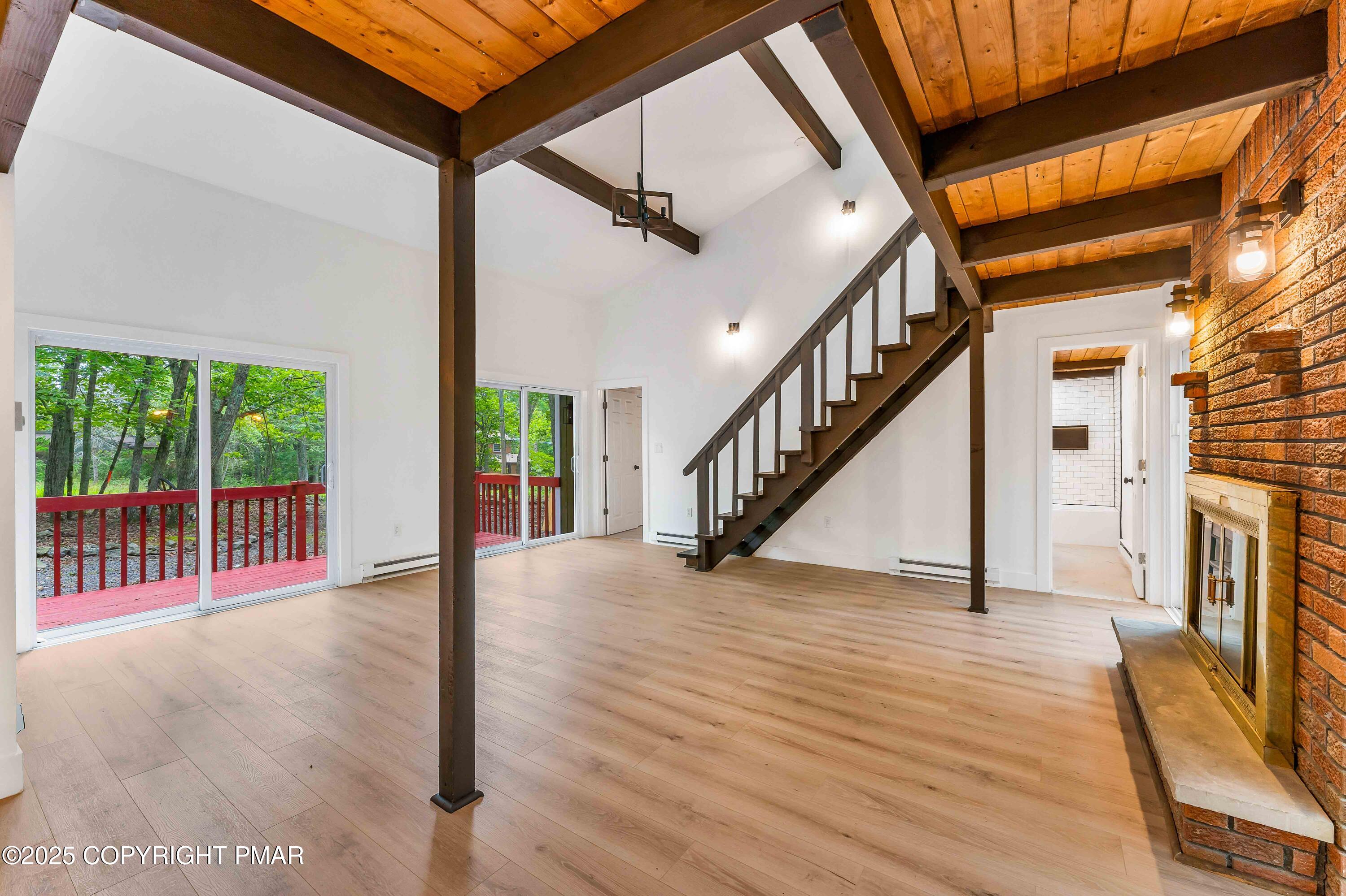 151 Elgin Way Bushkill, PA 18324 - Photo 28 of 60 a view of an entryway with wooden floor and door