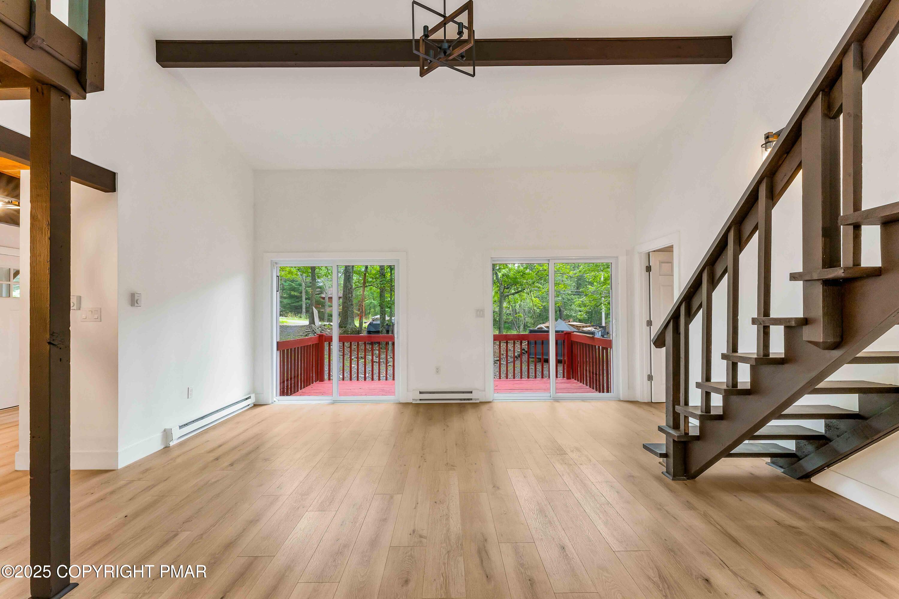 151 Elgin Way Bushkill, PA 18324 - Photo 31 of 60 a view of entryway with wooden floor and front door
