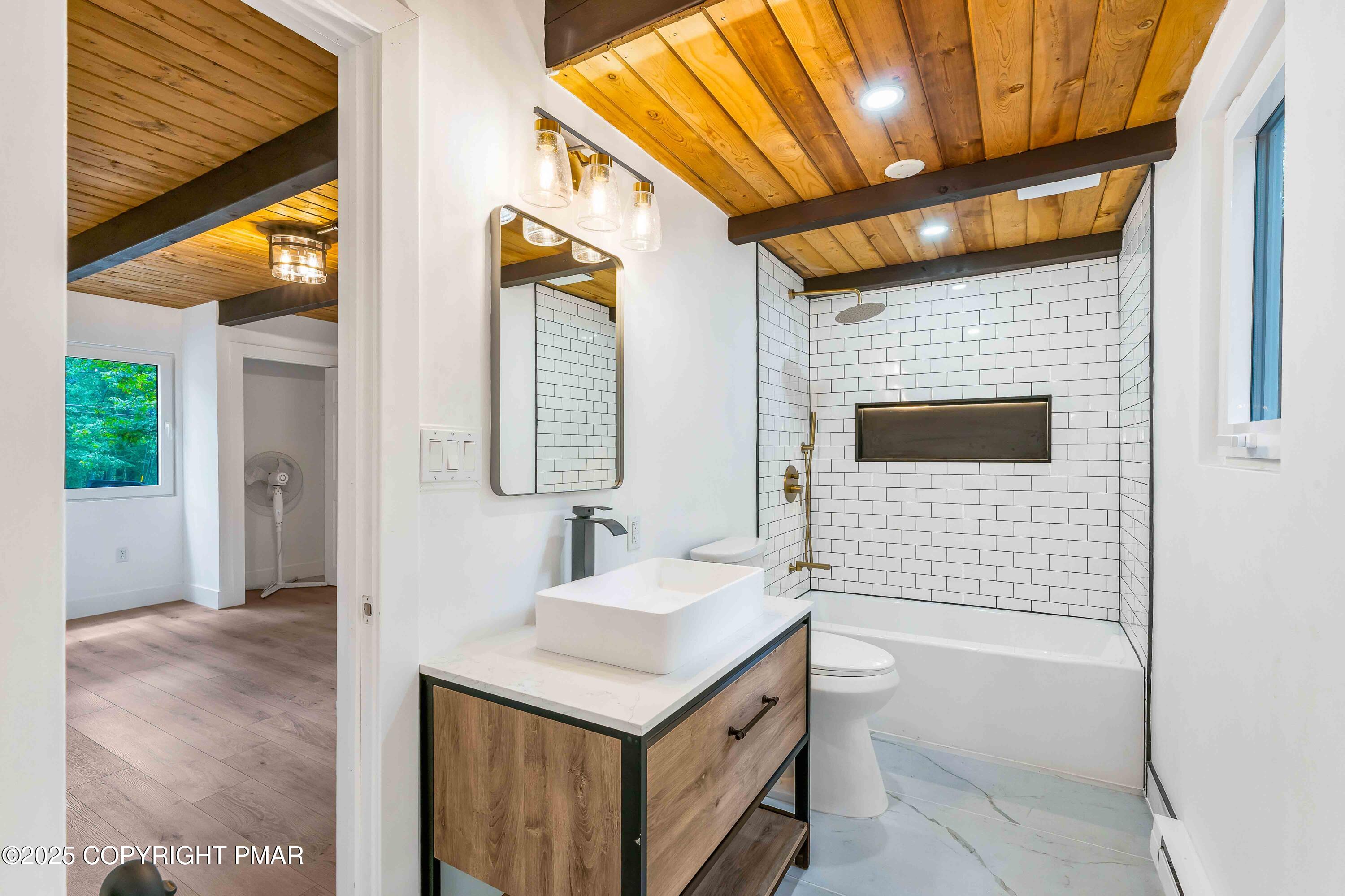 151 Elgin Way Bushkill, PA 18324 - Photo 32 of 60 a bathroom with a sink and a mirror