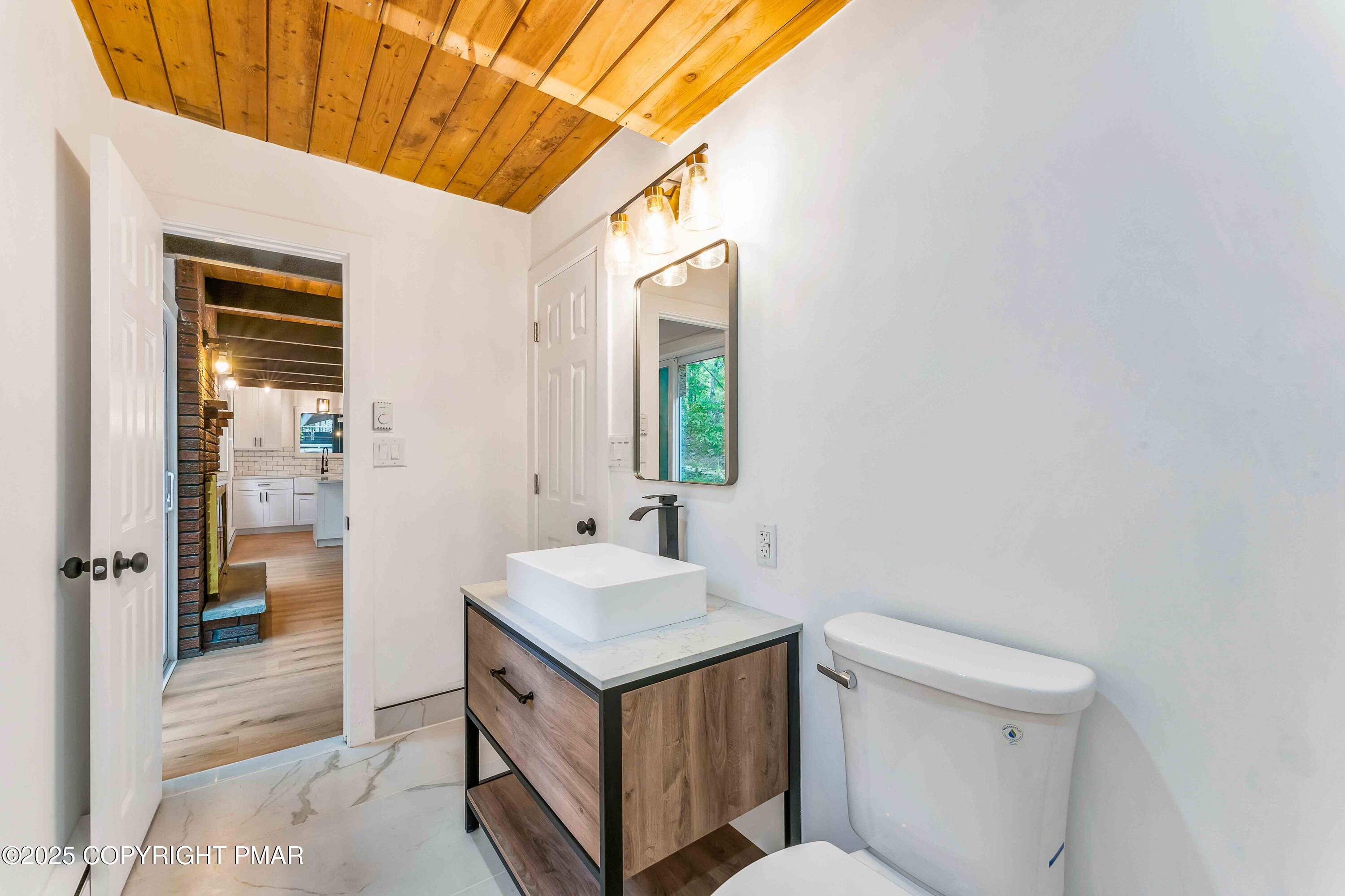 151 Elgin Way Bushkill, PA 18324 - Photo 34 of 60 a bathroom with a sink toilet and shower