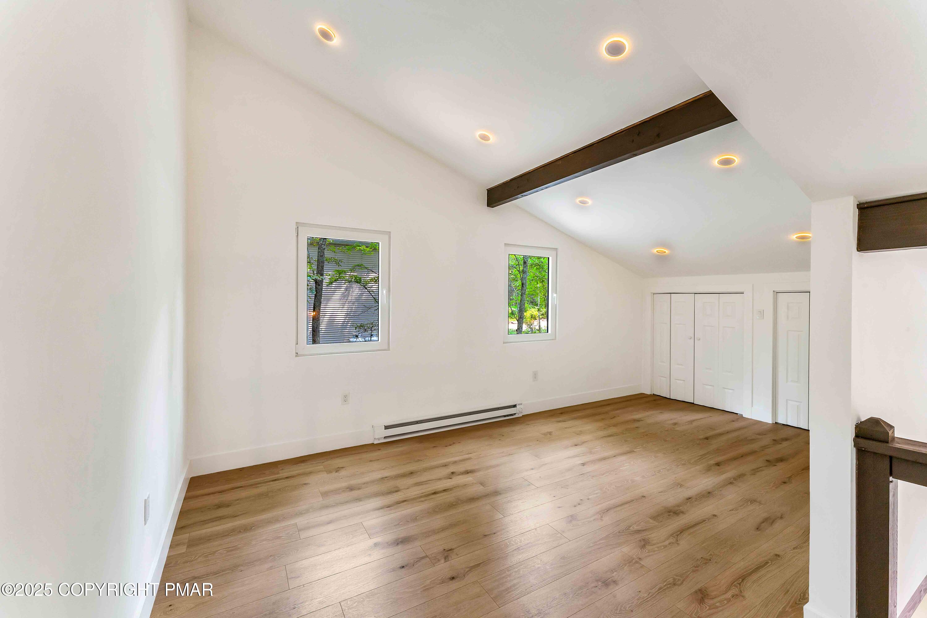 151 Elgin Way Bushkill, PA 18324 - Photo 54 of 60 a view of empty room with wooden floor
