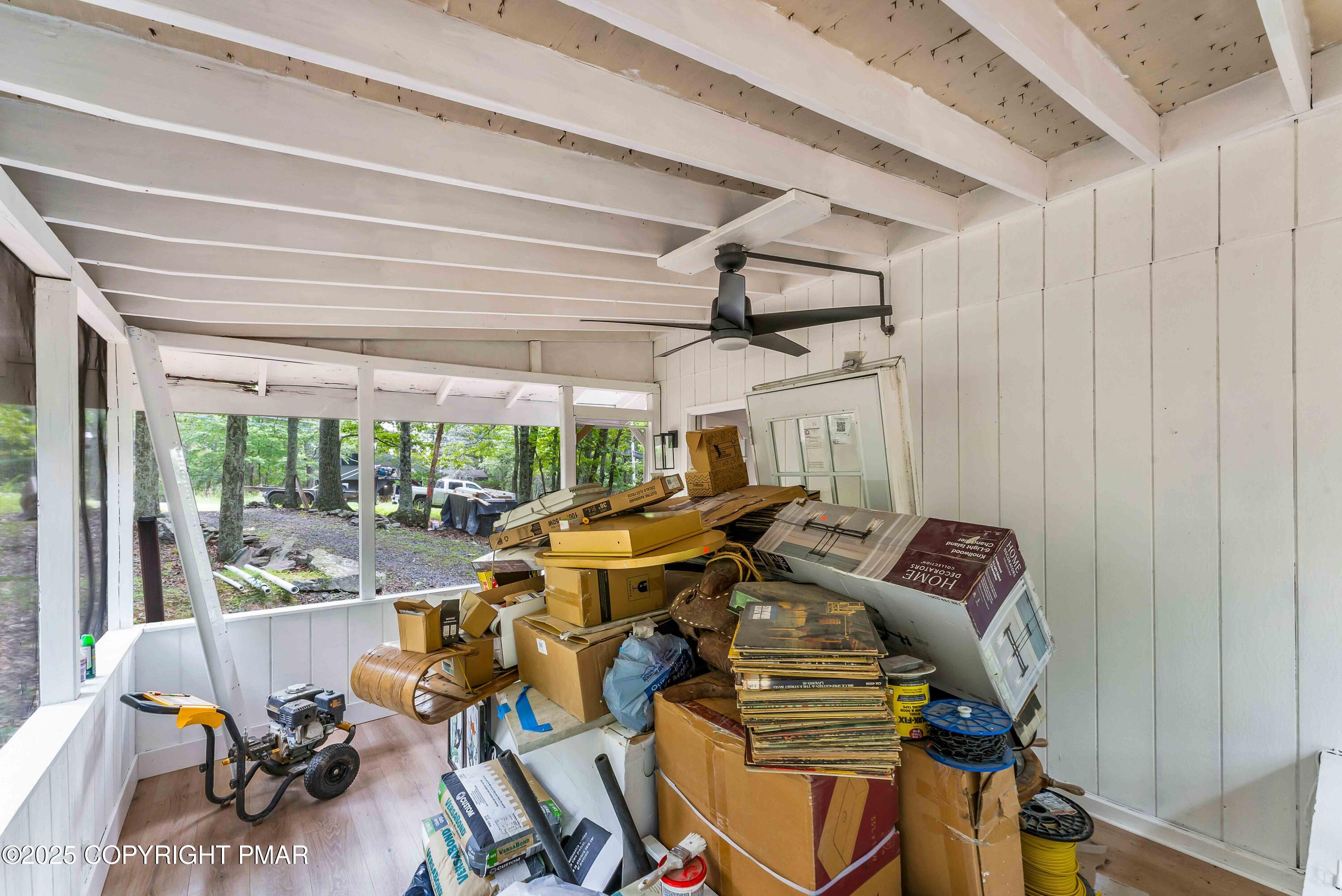 151 Elgin Way Bushkill, PA 18324 - Photo 57 of 60 a view of a patio with wooden furniture
