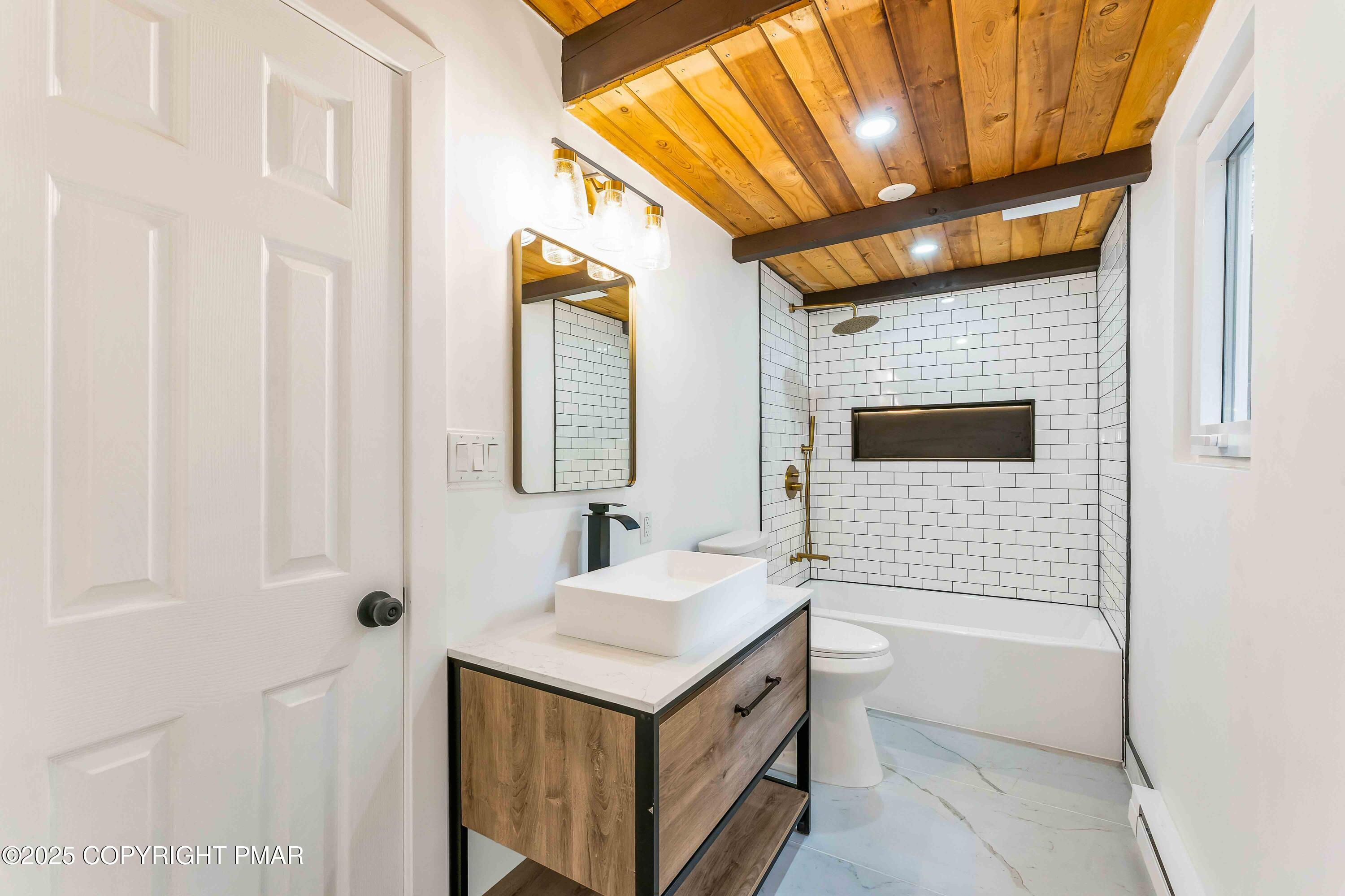 151 Elgin Way Bushkill, PA 18324 - Photo 6 of 60 a bathroom with a sink and a mirror
