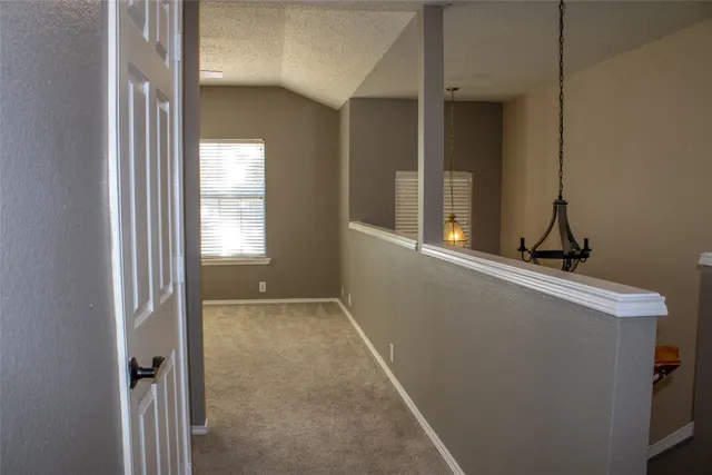 a view of a storage & utility room with a sink