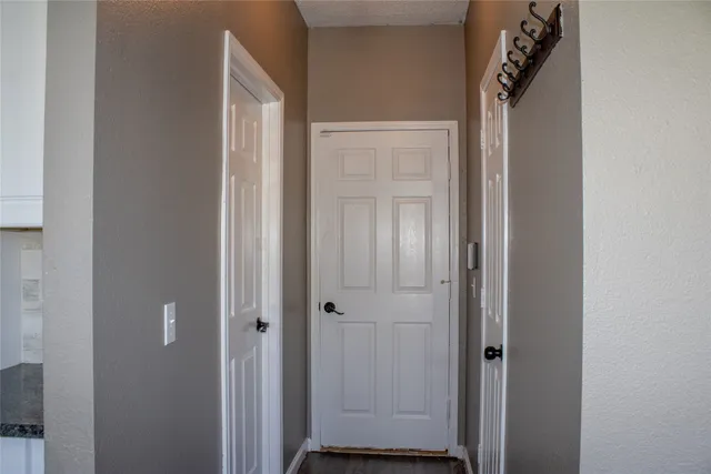 a view of a swimming pool with an outdoor seating