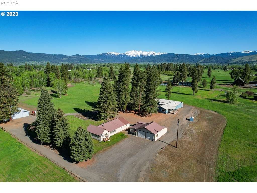 46198 Slaughterhouse Road Halfway, OR 97834 - Photo 2 of 40 a view of a lake with a mountain