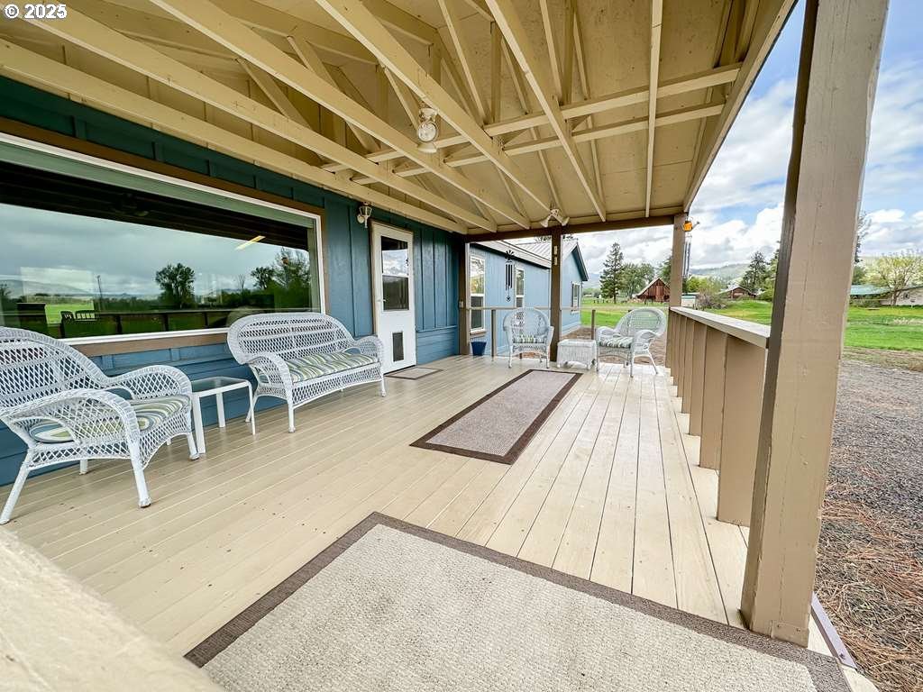 46198 Slaughterhouse Road Halfway, OR 97834 - Photo 7 of 40 a patio with a table and chairs