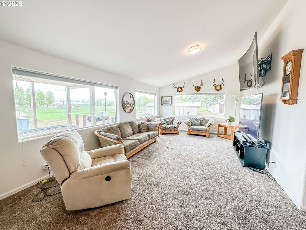 46198 Slaughterhouse Road Halfway, OR 97834 - Photo 8 of 40 a living room with furniture and a large window