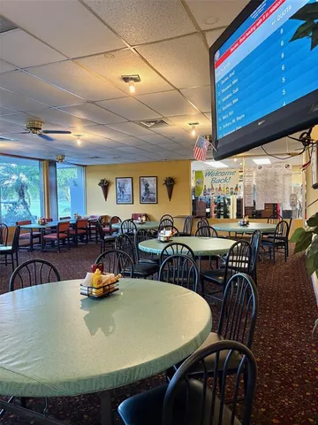 a view of a dining room with furniture