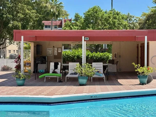 a view of a building with a yard