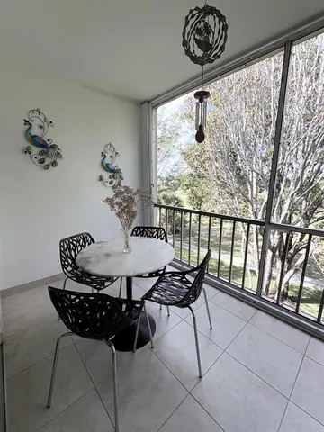 a table and chairs in a room