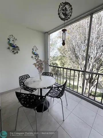 a kitchen that has a cabinets and a table in it