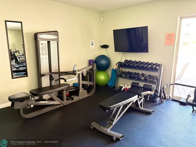 a room with lots of table and chairs