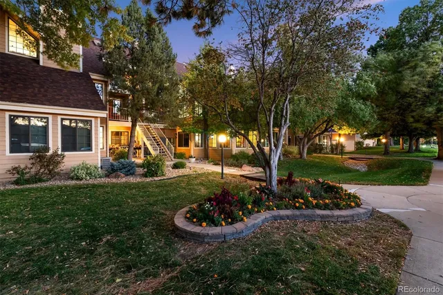 a view of a garden with a fountain
