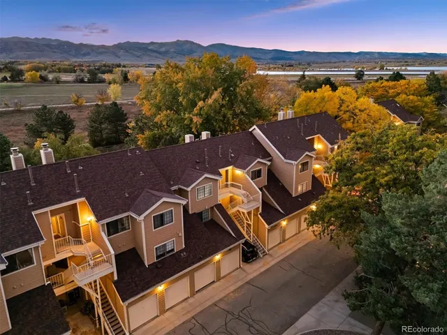 an aerial view of residential house with outdoor space and river