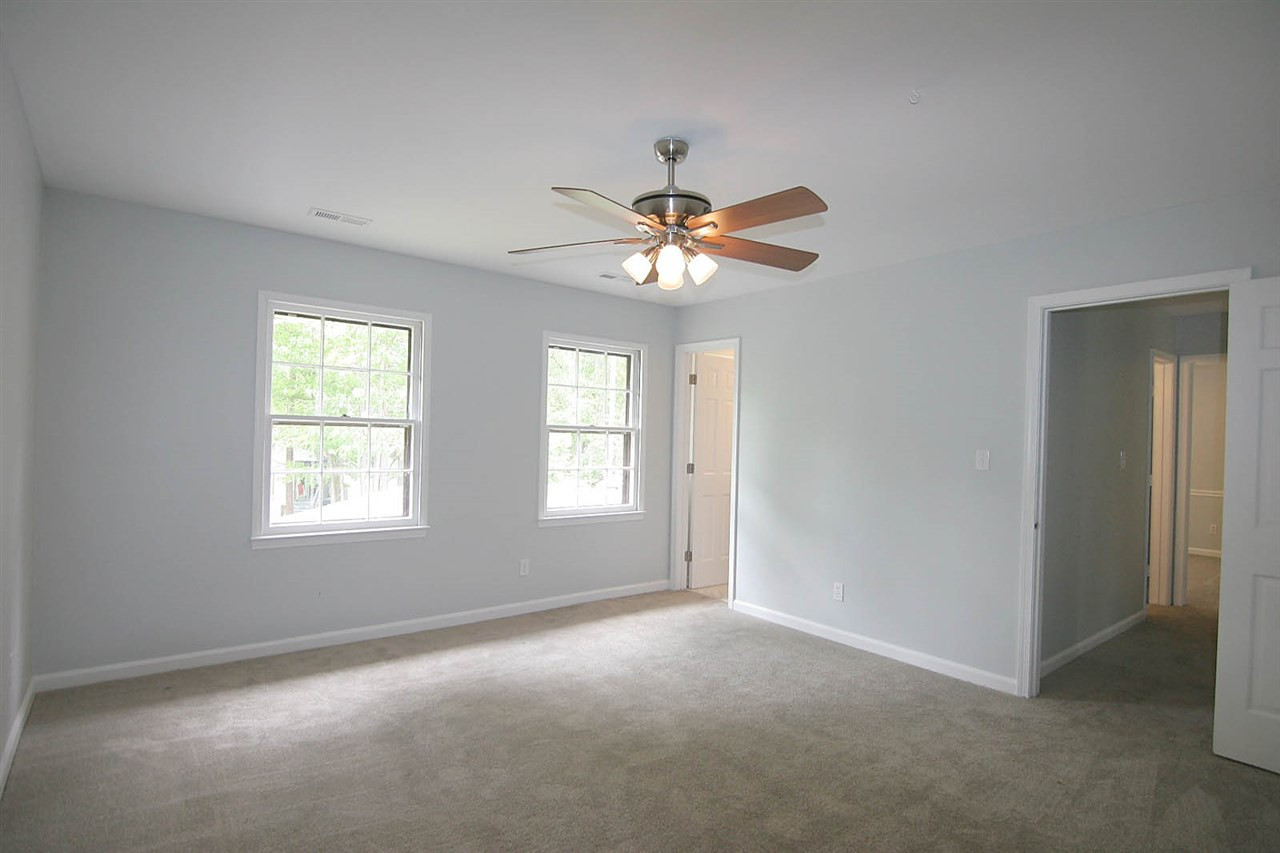 7801 Audubon Drive Raleigh, NC 27615 - Photo 15 of 25 Generously-sized Master Retreat is the Perfect Place to Relax at the End of the Day! Master Bedroom