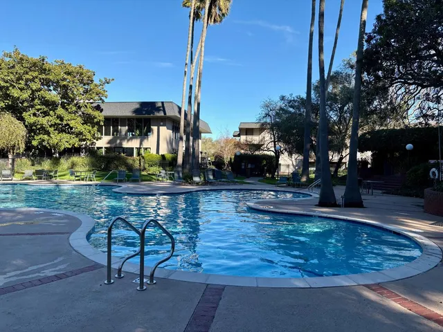 a view of a terrace with sitting area