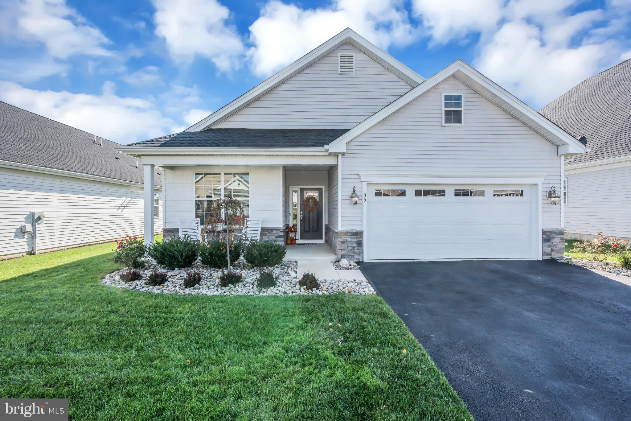 Charming home with inviting curb appeal.