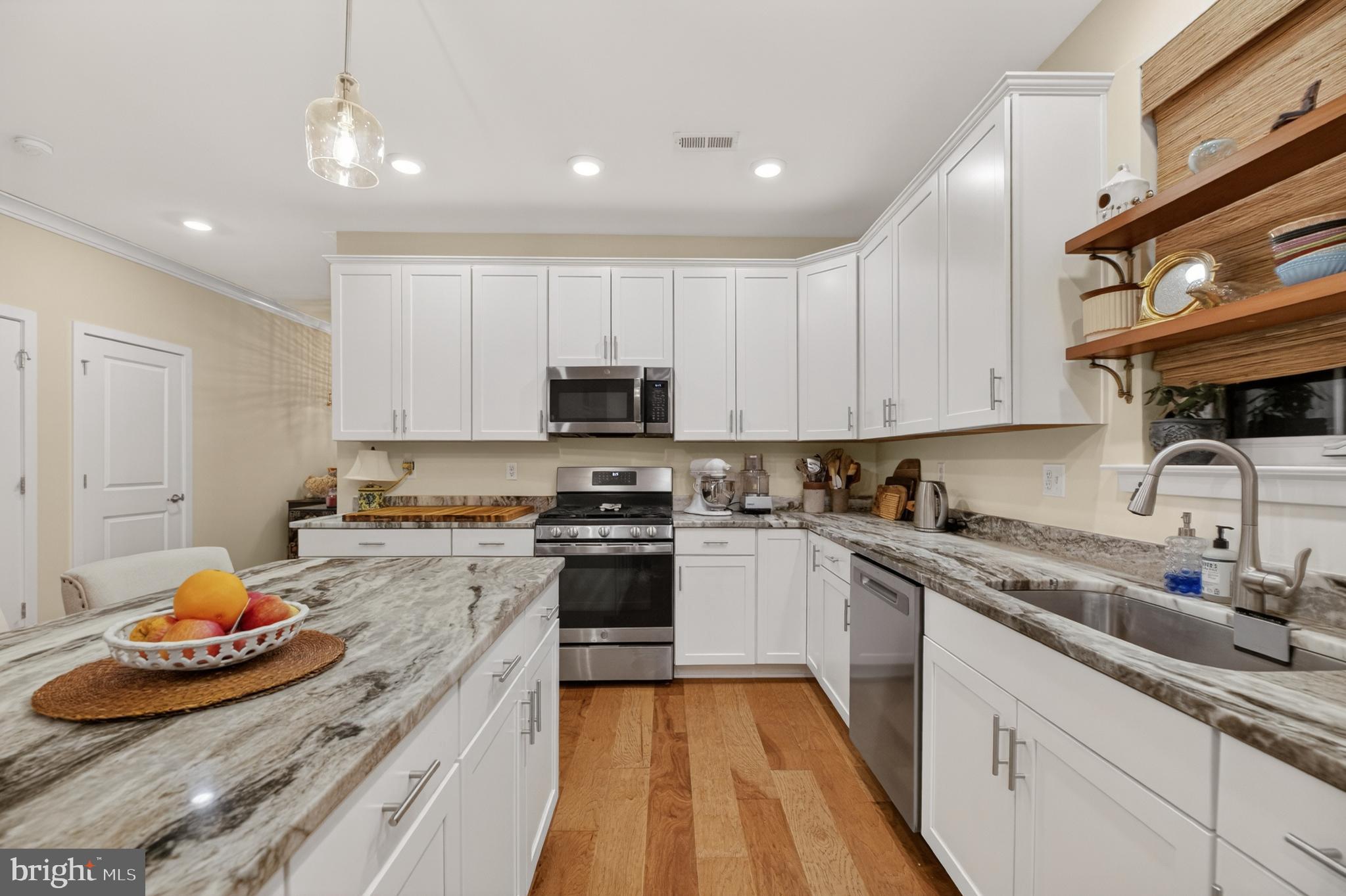 35 Saratoga Road New Egypt, NJ 08533 - Photo 20 of 52 a kitchen with stainless steel appliances granite countertop a sink stove and refrigerator