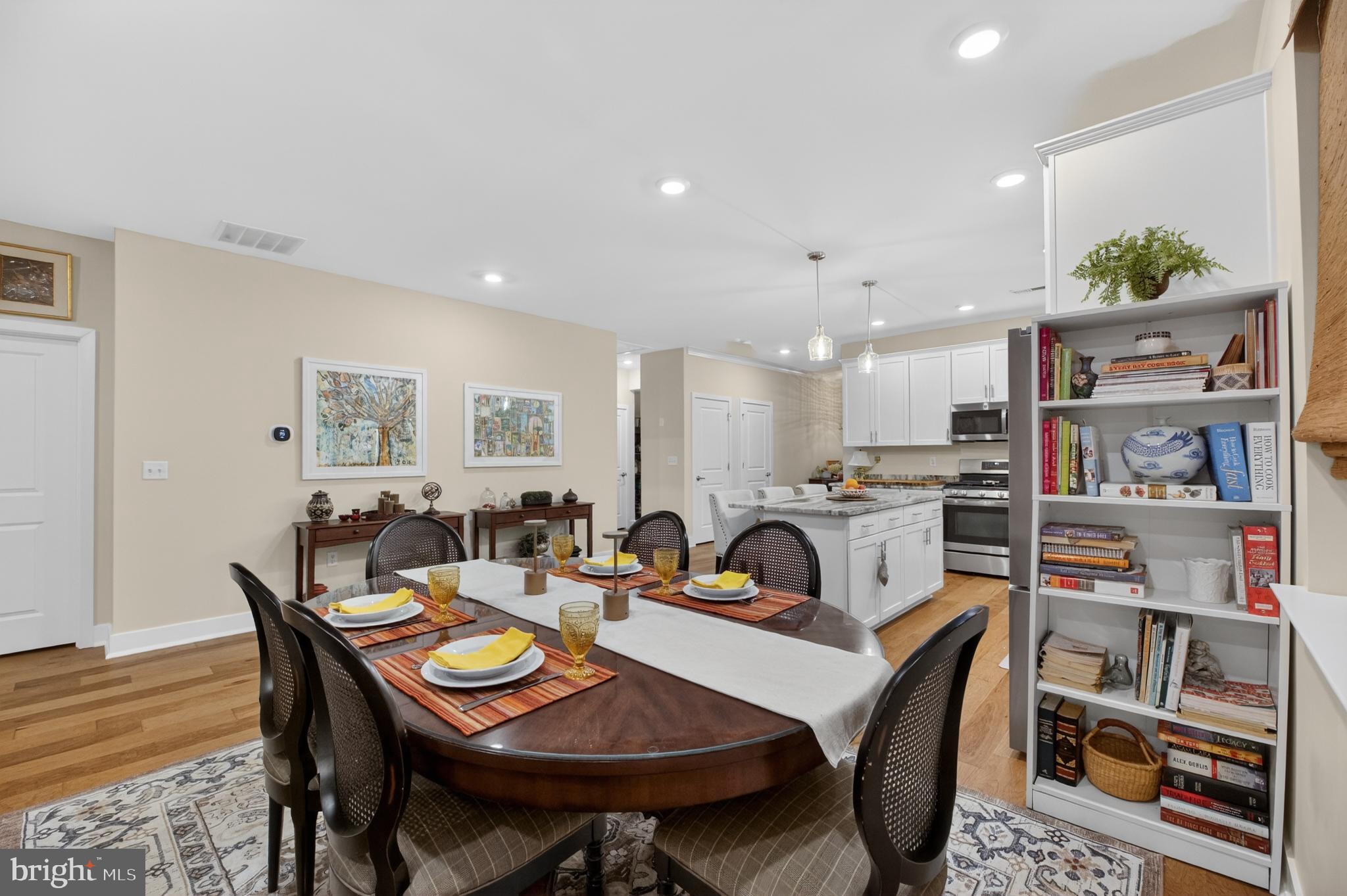 35 Saratoga Road New Egypt, NJ 08533 - Photo 23 of 52 a view of a dining room with furniture and a book shelf